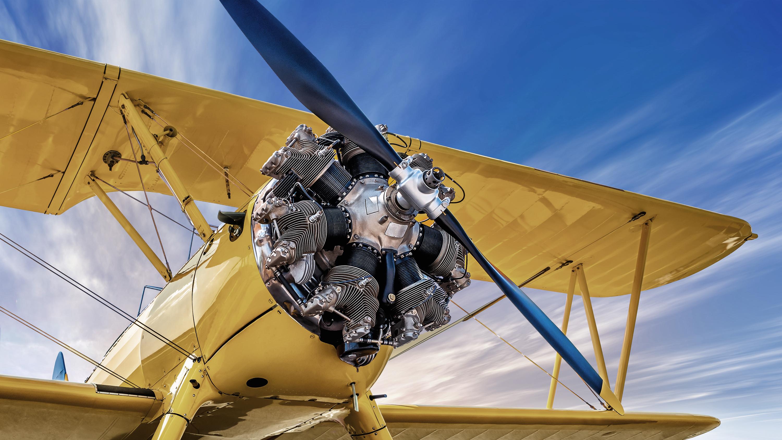 Close up shot of a small yellow plane